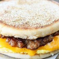 Sausage & Egg Sandwich · A sausage patty and two scrambled eggs on your choice of bread.