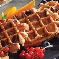 Premium Waffle, Meat And Egg Sandwich · Choice of meat and two scrambled eggs on Premium Belgian Waffle.
