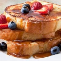 Premium French Toast With Small Homefries · Comes with three french toast (premium brioche breads), two eggs any style, choice of meat a...