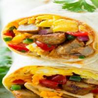 Turkey Bacon Burrito · Two scrambled eggs, turkey bacon, bell peppers, onions, tomatoes, homefries and melted chedd...