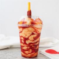 Mangonada · Blended sour mango drink with tajin & chamoy. Served with candy straw.