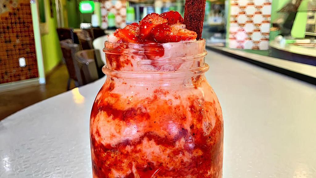 Strawberrynada · Sour blended strawberry smoothie served with chamoy, tajin, and a candy straw