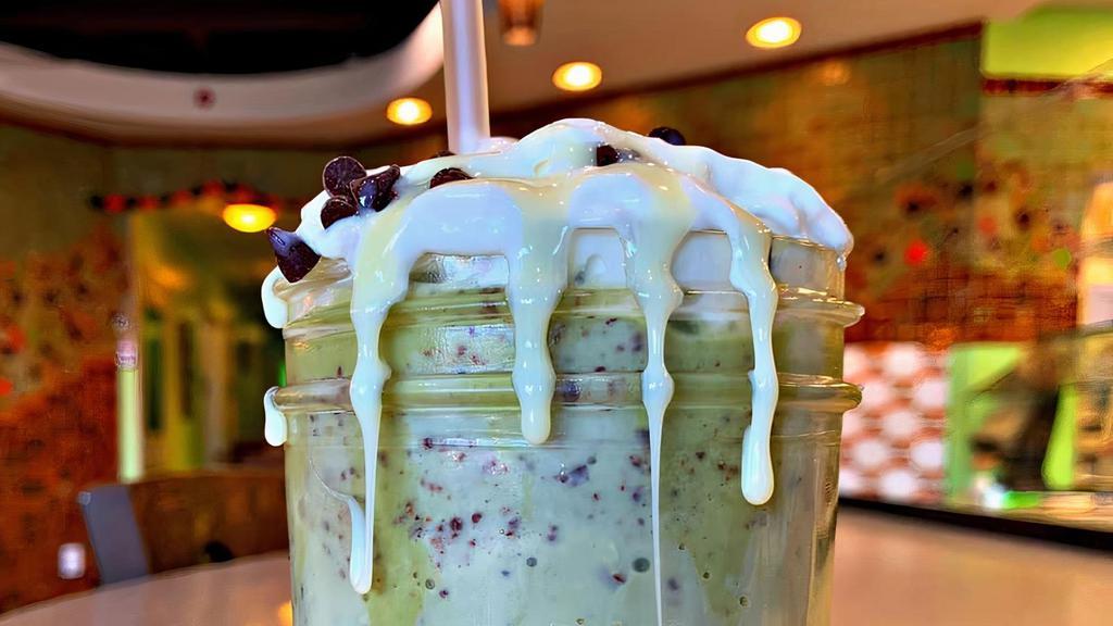 Matcha Chip Condensed Milk Frappe · Matcha frappe blended with chocolate chips and served with a condensed milk drizzle