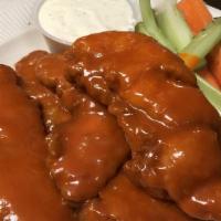 Buffalo Chicken Salad · Fried breast of chicken coated with hot sauce served on bed of lettuce with sliced carrots, ...