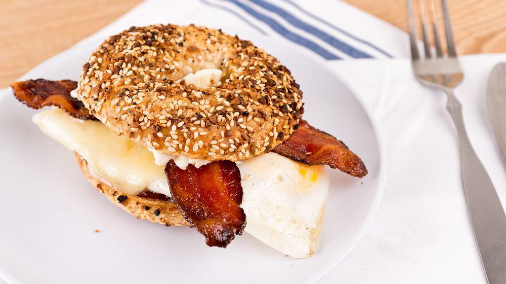 Ben'S Abomination · Over-easy egg, bacon, Swiss, cream cheese, raspberry preserves on everything bagel.