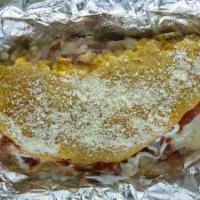Pork, Mozzarella Cheese & Vegetables · Soft Tortillas de maiz rellena de pernil, queso mozarella y vegatales.