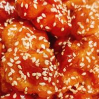 Sesame Chicken (C) · Served with pork fried rice and egg roll.
