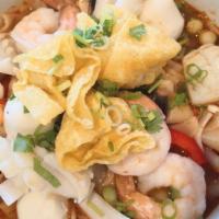 Seafood Lemongrass · Fat rice noodle, fish ball, shrimp, squid, fried wonton, spicy lemongrass broth. Menu item w...