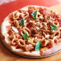 Crispy Calamari Pizza · Cheese-baked pizza dough topped with our American pizza sauce, a drizzle of garlic lemon aio...