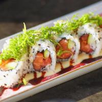 Salmon Roll · Salmon, lemon, wasabi, maldon sea salt flakes.  Made with sushi rice, wrapped with your choi...