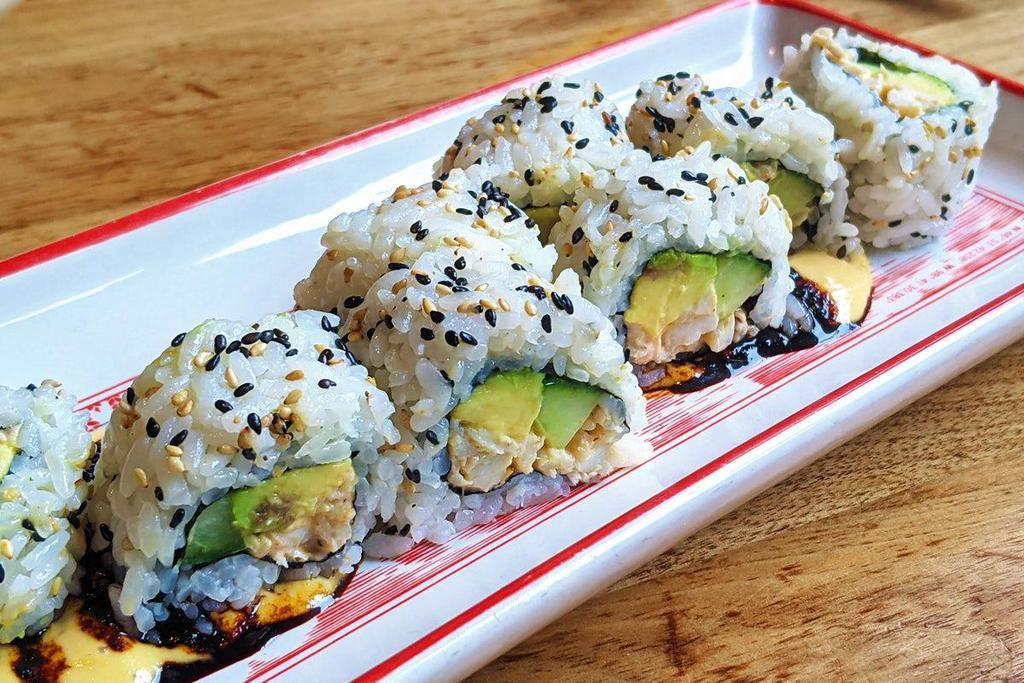 California Roll · Crab, cucumber, avocado, mustard aioli, tare soy glaze, toasted sesame seeds.  Made with sushi rice, wrapped with your choice of toasted nori or sesame soy paper.