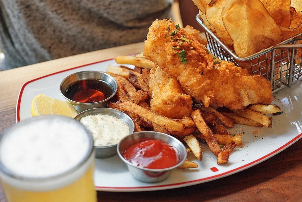 Fish & Chips · A traditional fish & chips feast. Fresh cod battered and lightly fried with Old Bay and served with fries and our house-made tartar sauce.