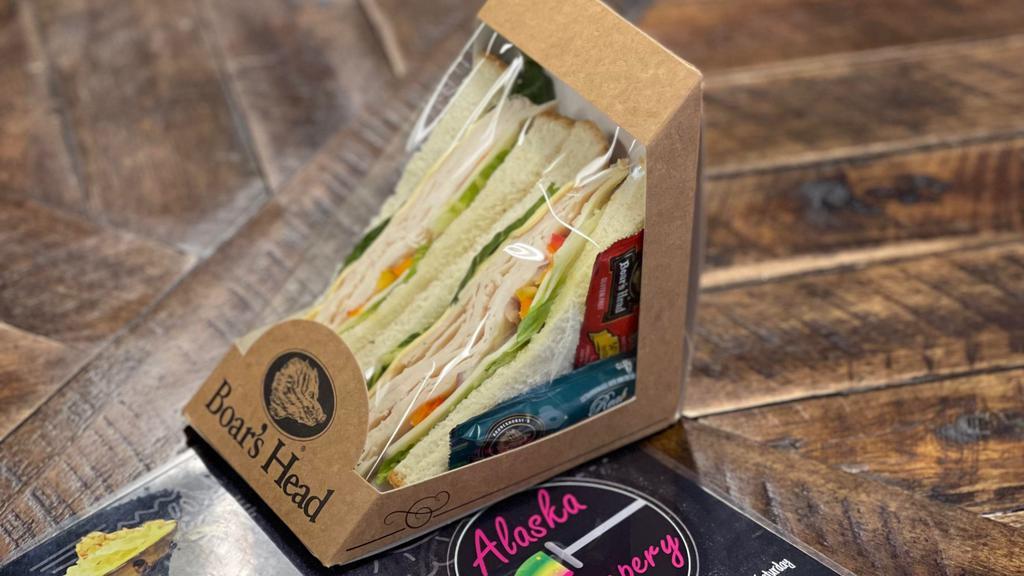 Boar'S Head Chicken Breast Sandwich · White Bread, Chicken breast, double layer of Romain Lettuce. Mild Swiss cheese and American Cheese; Red onion and colored bell peppers. Boar's Head Mayo and Mustard individual pack!