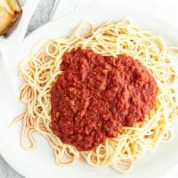 Spaghetti With Meat Sauce · SERVED WITH DINNER SALAD 
AND GARLIC BREAD