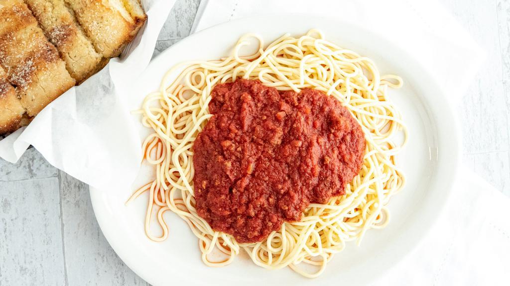 Spaghetti With Meat Sauce · SERVED WITH DINNER SALAD 
AND GARLIC BREAD