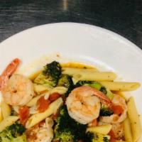 Shrimp & Broccoli Penne · Six large shrimp, fresh broccoli crowns sauteed in a fresh diced plum tomato, white wine and...