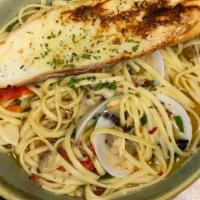 Whole Clams Linguini · Whole little neck and baby clams over linguini with homemade roasted red peppers, fresh basi...