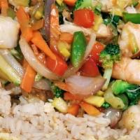 Seafood Stir-Fry · Shrimp and jumbo lump crab with a medley of fresh vegetables in our sweet stir fry sauce ser...