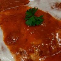 Veal Parmigiana · Tender veal hand breaded. Served with our own fresh tomato sauce and baked with mozzarella c...