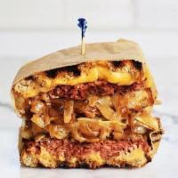 Beyond Melt · Beyond Beef Meatless Burger, American & Swiss Cheese, Grilled Onions, and Special Sauce on T...