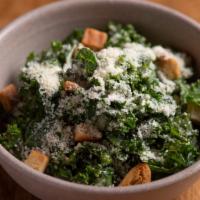 Kale Caesar · Baby kale, croutons, and house-made Caesar dressing.