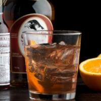 Ambar Old Fashioned · Plum rakia, bourbon, cane syrup, and bitters. Serves two.