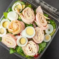 Chef'S Salad · Our garden salad topped with hard-boiled egg, ham, turkey, and Swiss cheese.