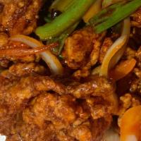 Orange Beef · Crispy beef with bell peppers, onions and scallions in a tangy spicy sauce. Spicy.
