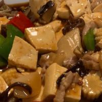 Mapo Tofu · Spicy. With or without diced pork, bell peppers, mushrooms, snap peas, water chestnuts and s...