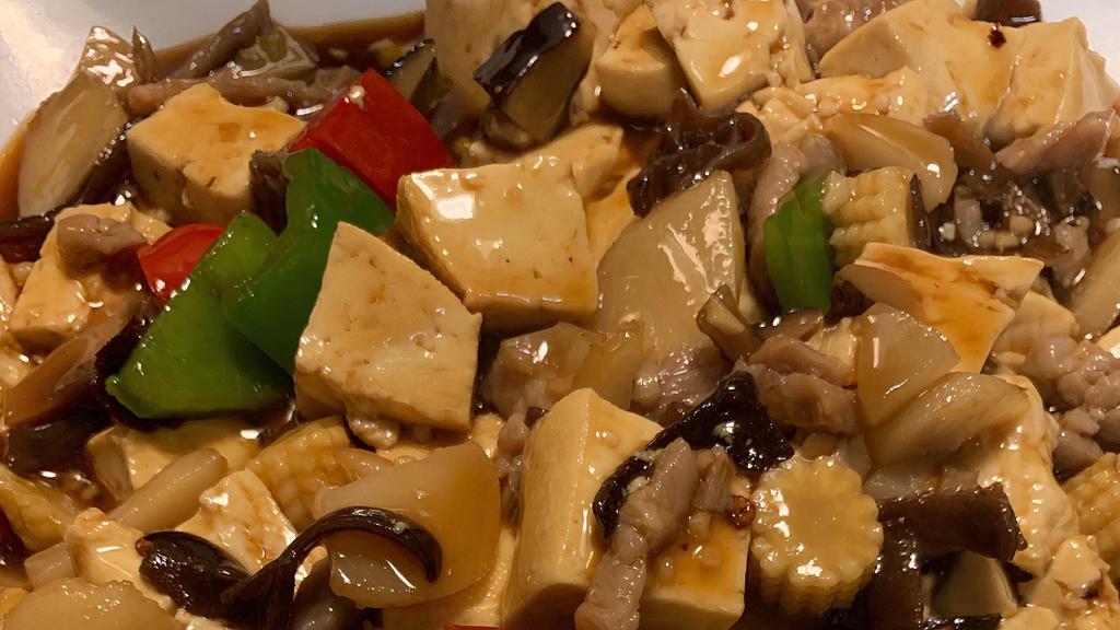Mapo Tofu · Spicy. With or without diced pork, bell peppers, mushrooms, snap peas, water chestnuts and soft bean curd. Spicy.