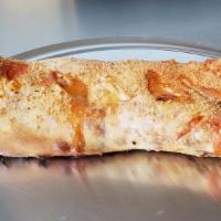 Stromboli · Our classic stromboli features fresh sliced mozzarella, our secret pizza sauce, grated chees...
