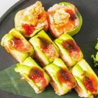 'Poseidon Roll · Spicy. Shrimp tempura, spicy crunchy tuna inside; topped sliced avocados, special sauce and ...