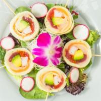 'Lollipop Roll · Salmon, tuna, yellowtail, crab sticks and avocado; wrapped with cucumber wrap. With house sp...
