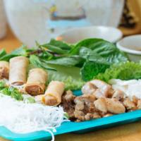 Diy You Wrap · Platter includes rice paper, vermicelli noodle, lettuce, herbs, pickled carrot, cucumber, fi...