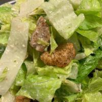 Caesar · Crisp Romaine lettuce with croutons, shaved Parmesan cheese, and Turner's Caesar dressing.  ...