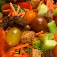 Garden Salad · Fresh Field Lettuce with carrots, cucumbers, tomatoes, and red bell peppers. Served with Bal...