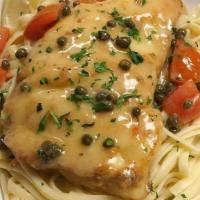 Haddock Piccata Dinner · Wild Atlantic Haddock pan seared with butter, lemon, tomato, garlic, and capers served over ...