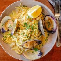 Linguine & Clams · Chopped Clams and Cherrystones in garlic, wine , and basil butter tossed with linguini
