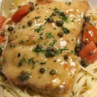 Chicken Piccata Dinner · White wine, butter, lemon, garlic, tomatoes and capers, served over pasta