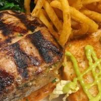 Tuna Burger · Diced Yellowfin Tuna, seasoned and topped with Napa Slaw and Wasabi Aioli on a Griddle Bun. ...