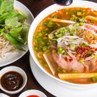 Spicy Lemongrass Beef Broth · Vermicelli served with rare steaks and briskets served with special lemongrass broth. 475 ca...