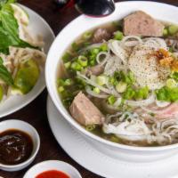 Pho Dac Biet · Rare steak, brisket, tendon, meatball in beef broth served with Pho noodle