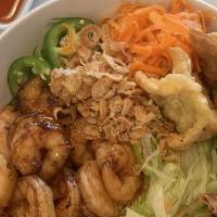 Shrimps Noodles · 470 Calories vermicelli served with stir fried shrimps, lettuce, cucumber, basil, vietnamese...