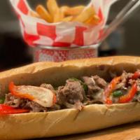 Philly Cheesesteak · Steak, American cheese, peppers and onions, served with fries.