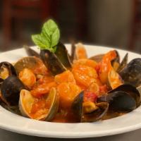 Linguini Fra Diavolo · Clams, shrimp, mussels, scallops, garlic and spicy marinara sauce with linguini.