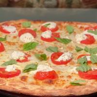 White · Ricotta and mozzarella cheeses with garlic, sliced garden tomatoes, white onions and basil.