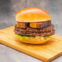 Pork Belly Burger · Two 3oz. patties topped with two pieces of pork belly with a savory glaze, romaine lettuce a...