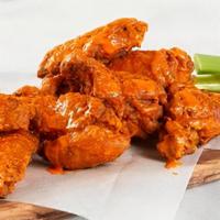 Buffalo Wings · Ten deep-fried crispy wings tossed in medium buffalo sauce. Served with celery sticks and a ...