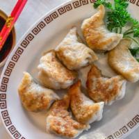 Dumpling (8) · 8 pieces. steamed or pan-fried.