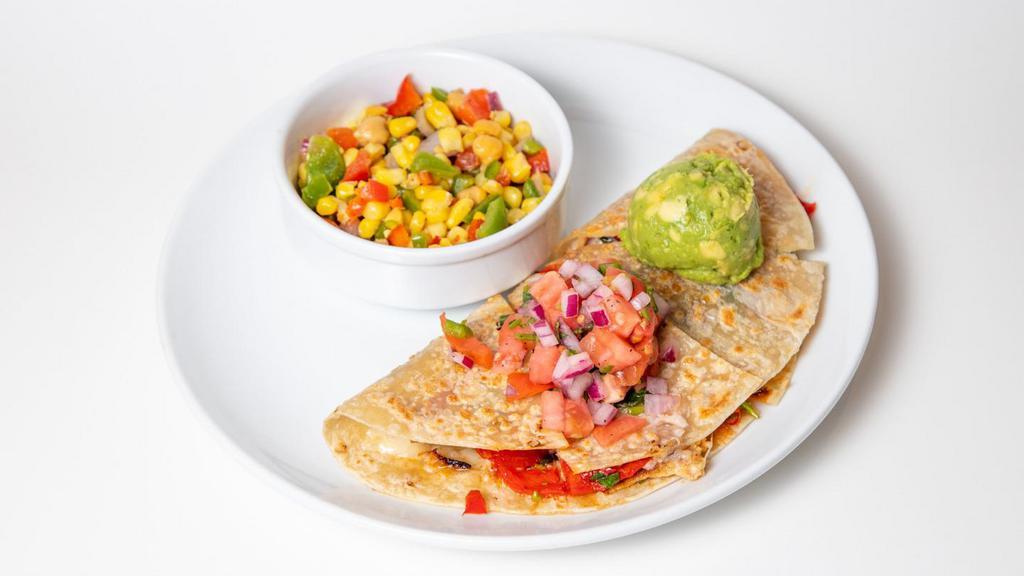 Pico Quesadilla · Our Crispy Chicken, Cheddar Cheese, Roasted Red Peppers, Avocado & Pico de Gallo. Allergens: Dairy and Egg.